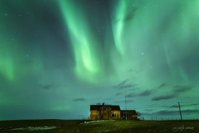 northern lights over the old house in lofoten, norway