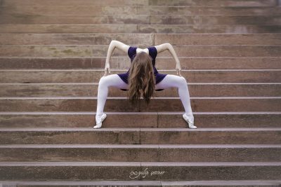 ballerina girl is in the action on the stairs